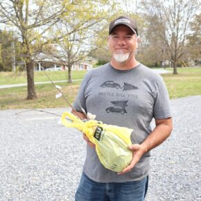 Larry Horn holds his seedlings.
