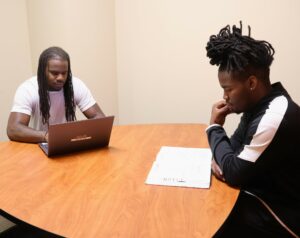 Reginald Hunter, left, and Richard Hunter study in the Center for Academic Success and Tutoring.