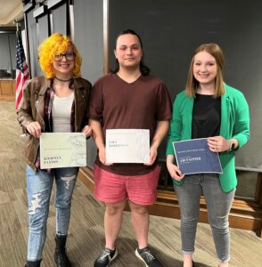 Winners in the Curtis ’28 and Billie Owens Literary Prize competition in 2023 included, left to right, Kiersten Paxton, Cole Robertsen and Abi Painter (now Campbell). 